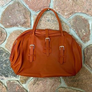 Ester Lauder faux leather tote bag.